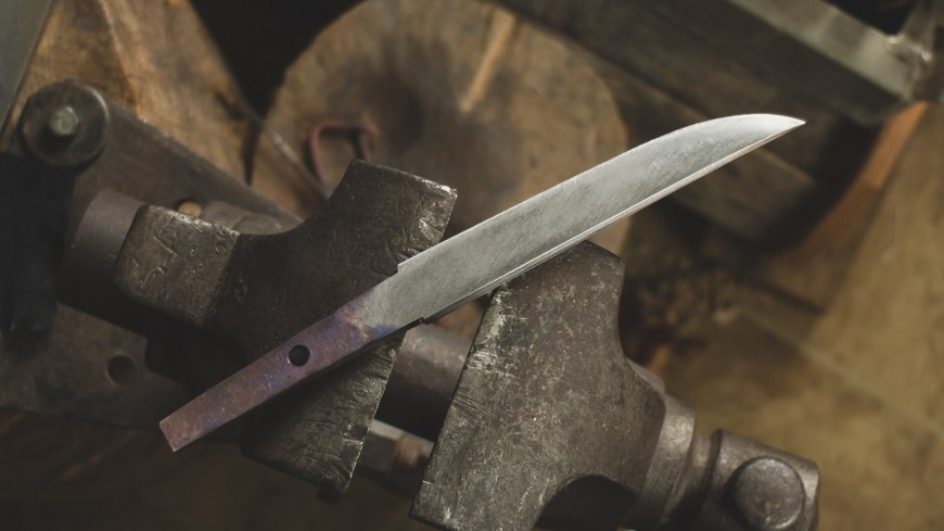 knife blade close up against after being sharpened