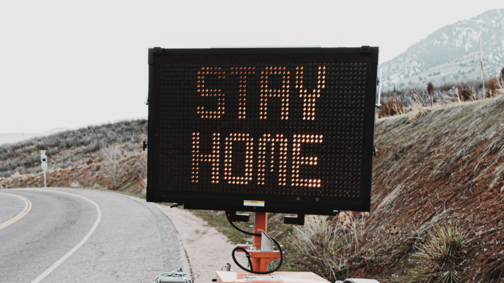 Stay Home on digital road sign